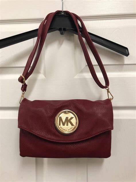 Michael Kors adjustable strap handbags